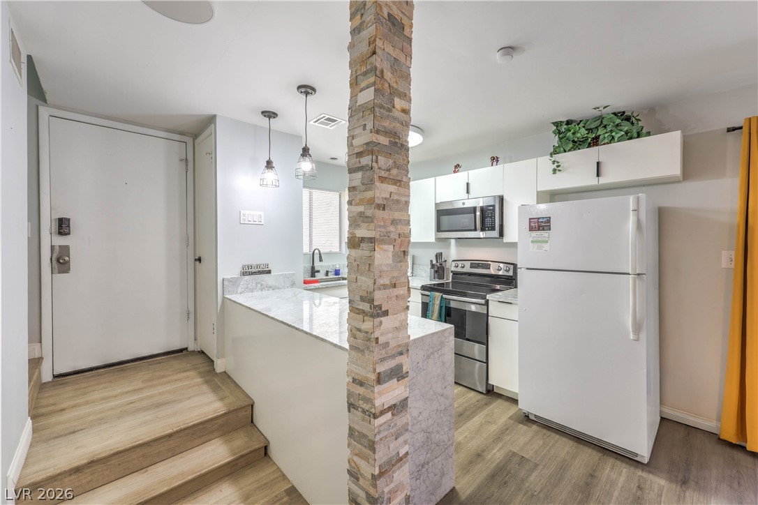 Photo 10 of 27, 5045 Spencer Street #B
